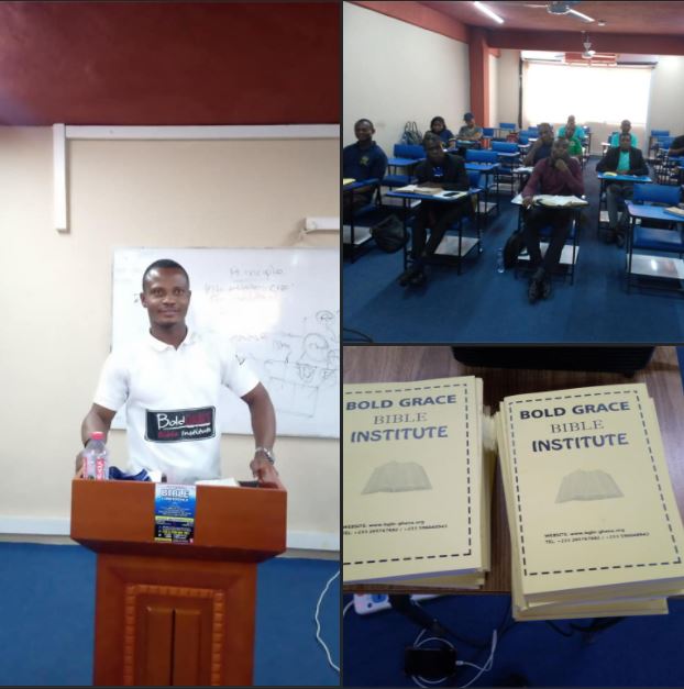 cyprian speaking to classroom of students with handouts