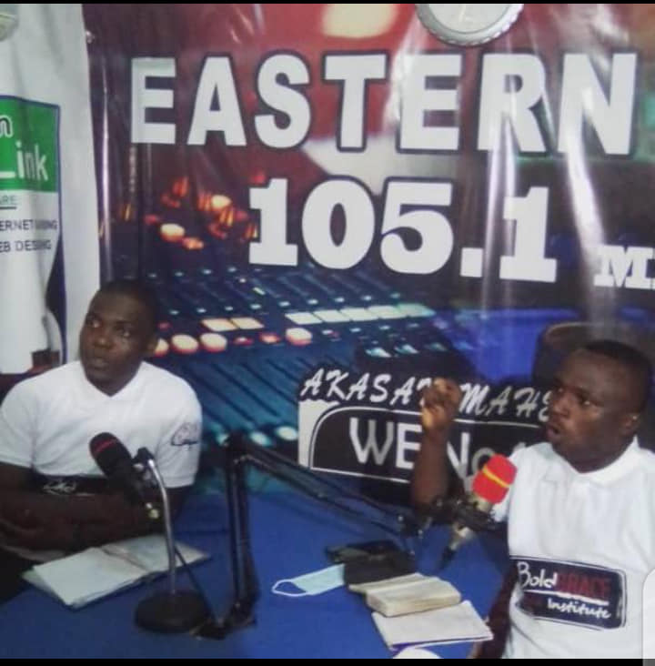 Frank Kweku Baah and Dennis Hanson  at the FM station